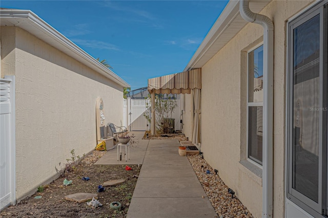 view of property exterior featuring a patio