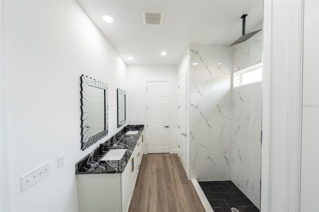 corridor featuring hardwood / wood-style floors