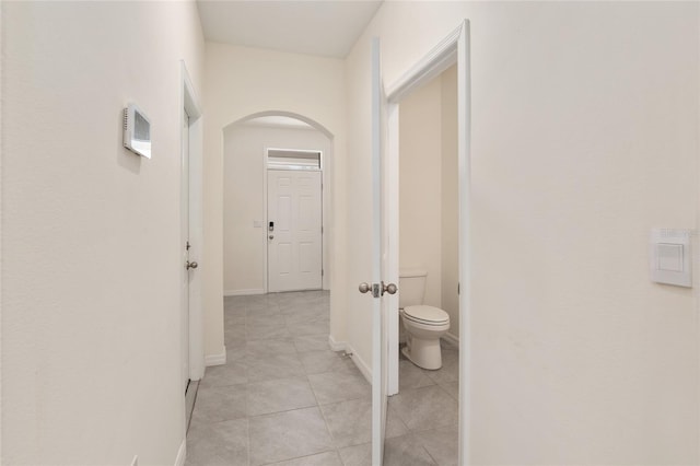 13818 NW 9th Rd, Newberry, FL 32669 - corridor featuring light tile patterned floors