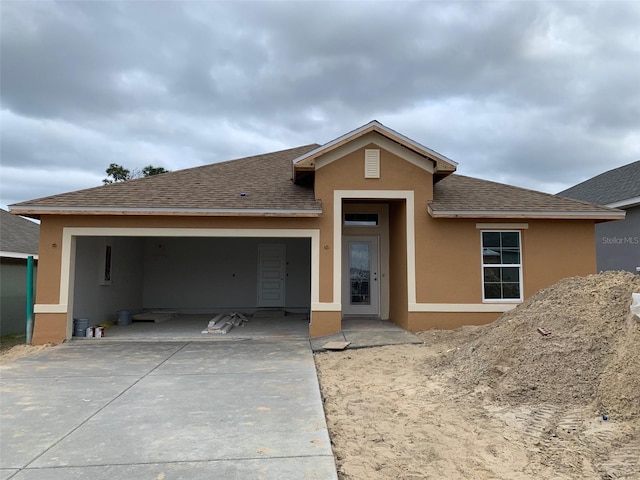 view of front of home with a garage