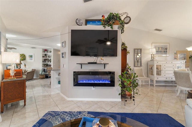 living room with lofted ceiling, tile patterned flooring, and built in features