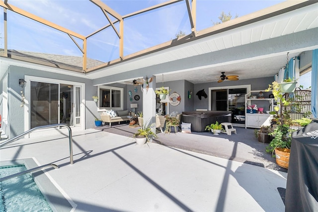 sunroom with ceiling fan