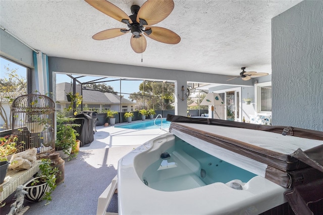 view of swimming pool with a lanai and a patio area