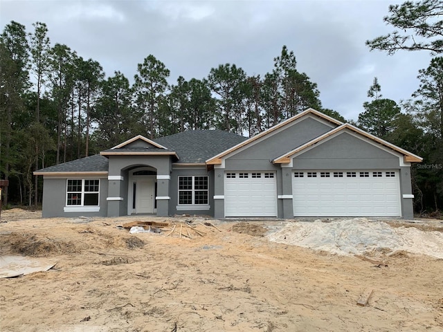 view of front of home with a garage