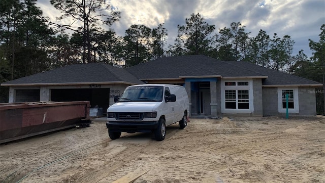 view of front of home with a garage