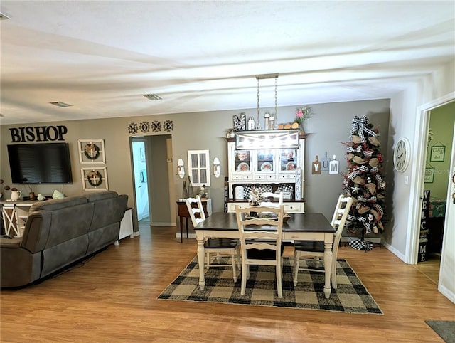 dining room featuring wood-type flooring