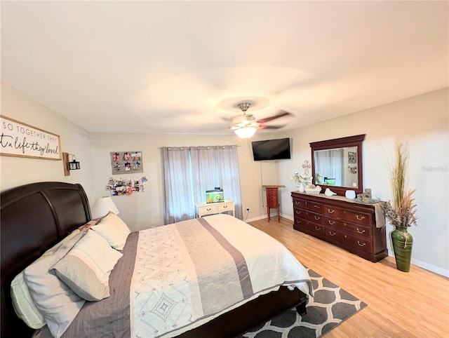 bedroom featuring ceiling fan and light wood-type flooring