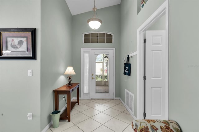 entryway featuring light tile patterned floors