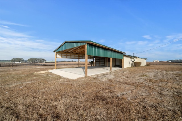 exterior space with a rural view