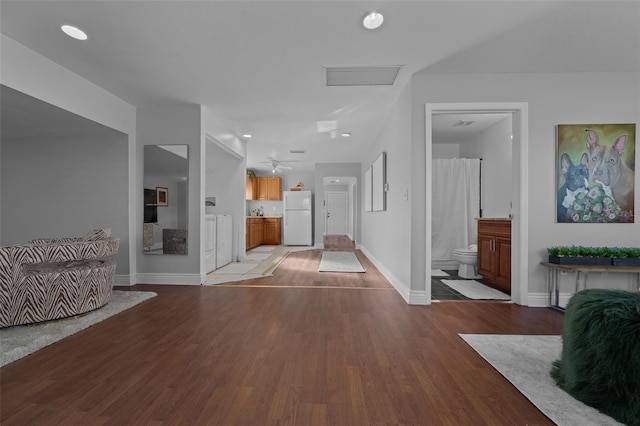 entrance foyer featuring light wood-style floors and baseboards