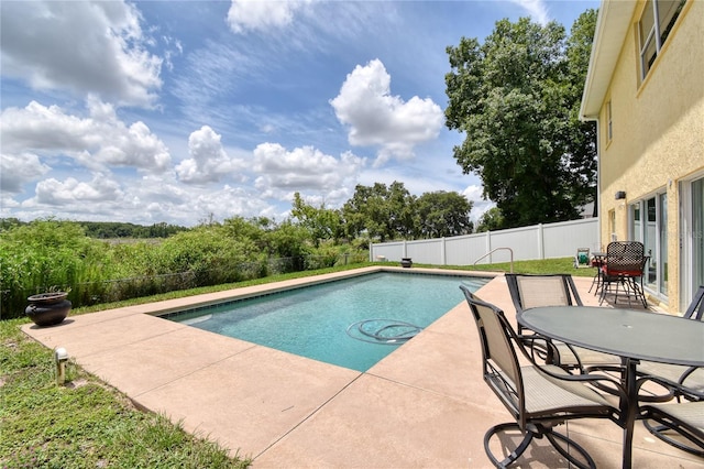 view of pool with a patio area