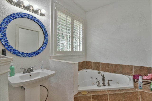 bathroom featuring a relaxing tiled tub