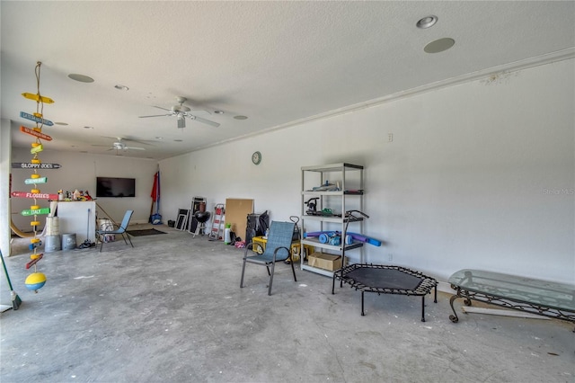 misc room with concrete floors and a textured ceiling