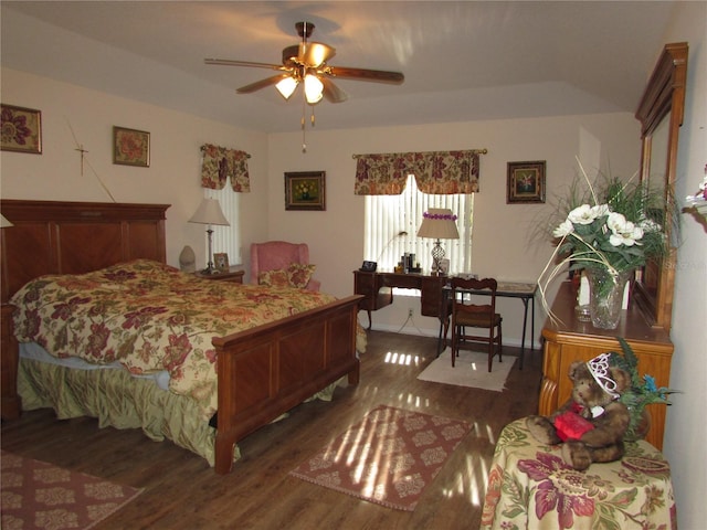 bedroom featuring dark hardwood / wood-style flooring