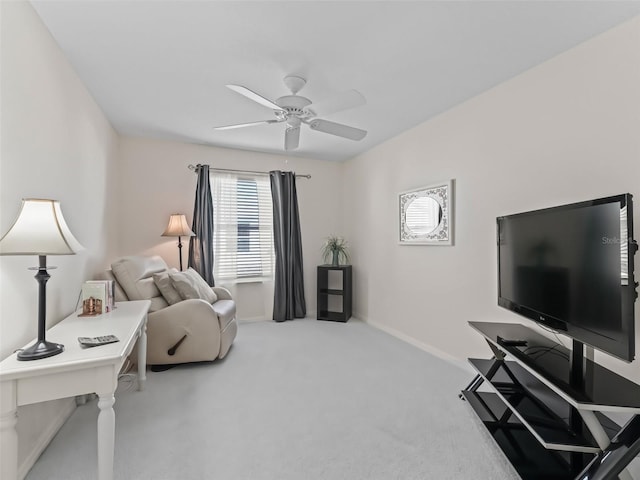 living room featuring ceiling fan and light carpet