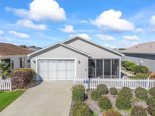 ranch-style home featuring a garage