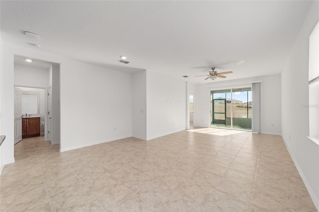 empty room featuring ceiling fan