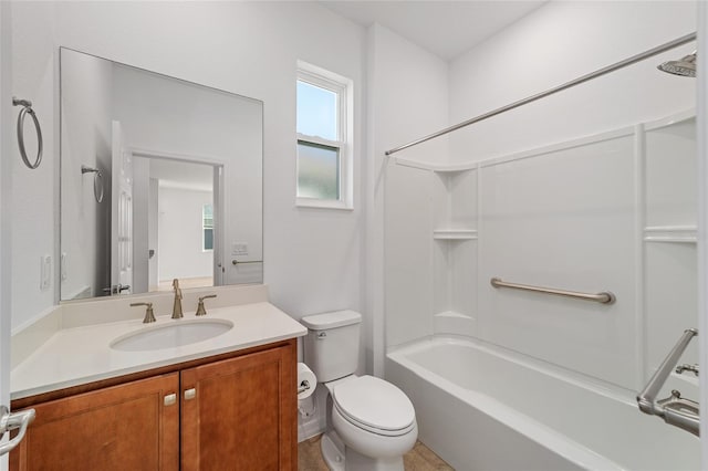 full bathroom featuring shower / bath combination, vanity, and toilet