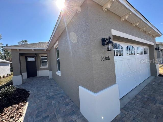 view of home's exterior featuring a garage