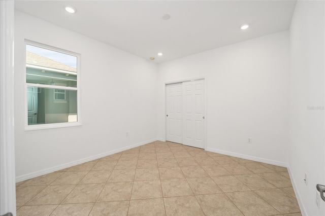 view of tiled spare room