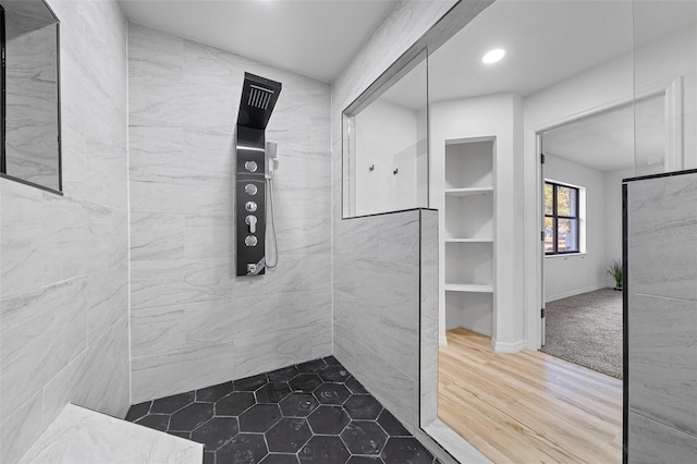 bathroom with hardwood / wood-style floors