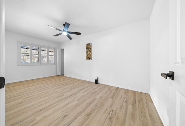 unfurnished room featuring ceiling fan and light hardwood / wood-style floors