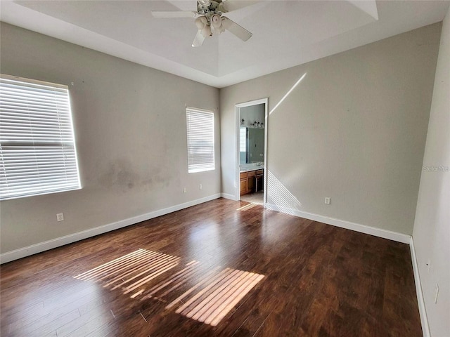 spare room featuring ceiling fan and wood-type flooring