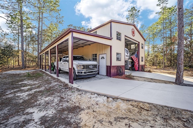 view of home's exterior with a carport