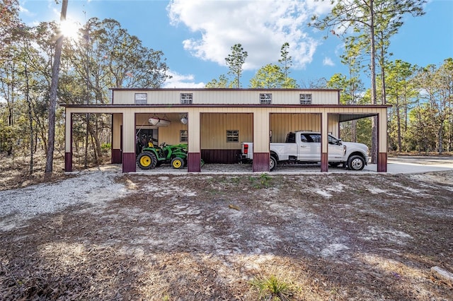 exterior space featuring a carport