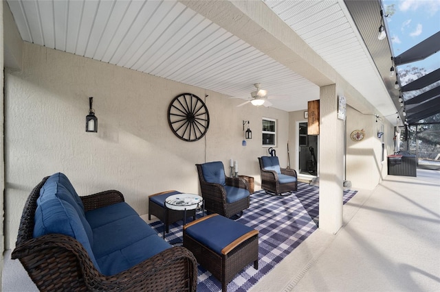 view of patio / terrace featuring ceiling fan and outdoor lounge area