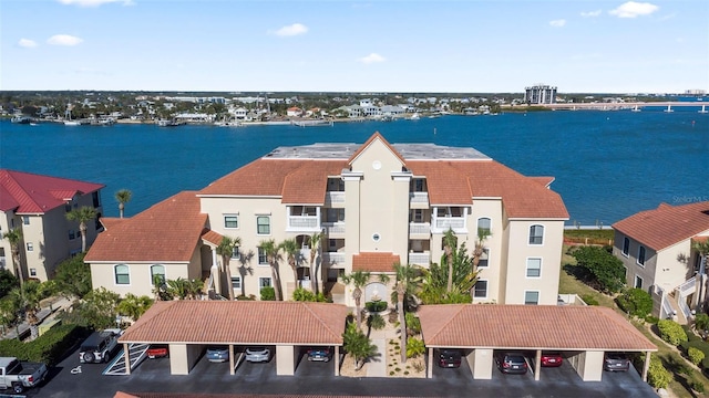 birds eye view of property featuring a water view