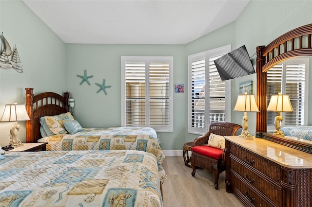 bedroom featuring light hardwood / wood-style floors