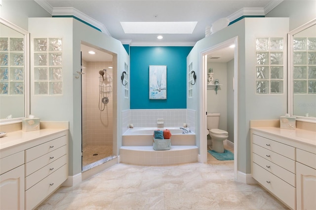 full bathroom with plus walk in shower, a skylight, ornamental molding, vanity, and toilet