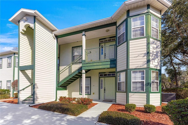 view of front of property with a balcony