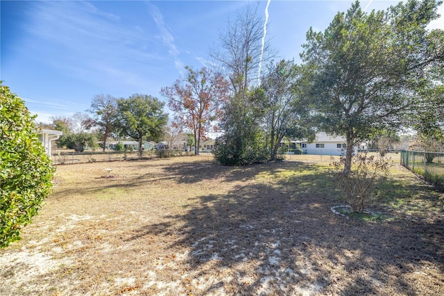 view of yard with a rural view