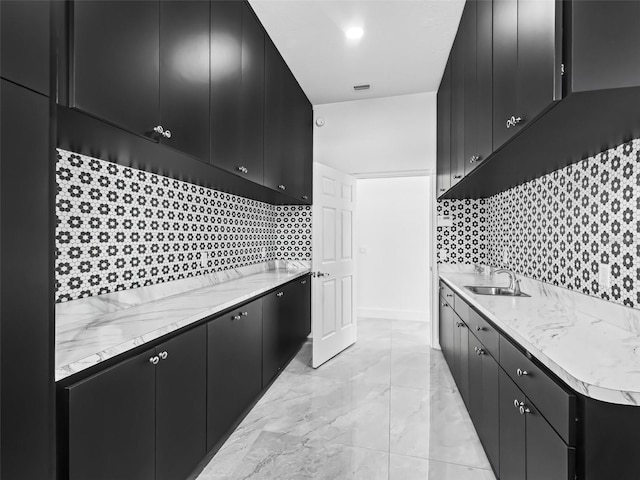 kitchen with sink and backsplash