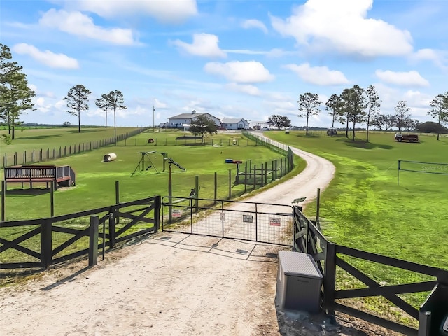 view of home's community featuring a lawn