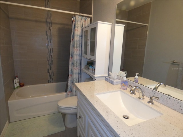 full bathroom featuring vanity, shower / bathtub combination with curtain, and toilet