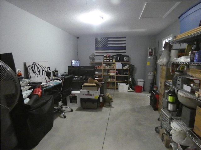 home office featuring water heater and concrete flooring