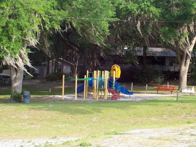 view of jungle gym featuring a yard