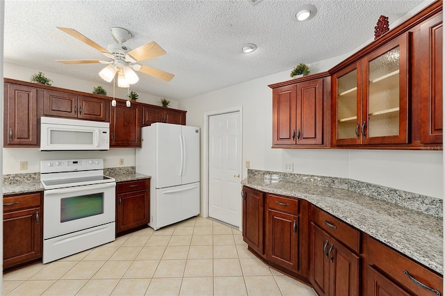 kitchen featuring light tile patterned floors, white appliances, glass insert cabinets, a textured ceiling, and a ceiling fan
