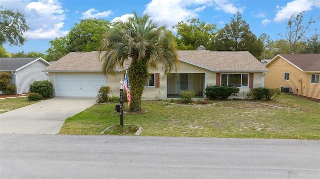 8450 SW 115th Street Rd, Ocala, FL 34481 - view of front of house featuring a chimney, a garage, a front lawn, and concrete driveway