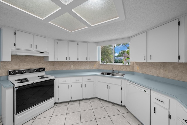 8450 SW 115th Street Rd, Ocala, FL 34481 - kitchen featuring white appliances, light tile patterned floors, under cabinet range hood, a sink, and white cabinets