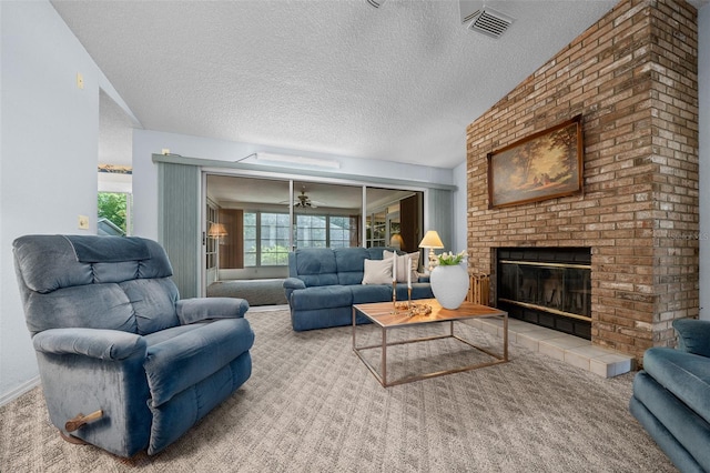 8450 SW 115th Street Rd, Ocala, FL 34481 - carpeted living room featuring a textured ceiling, visible vents, ceiling fan, and a brick fireplace