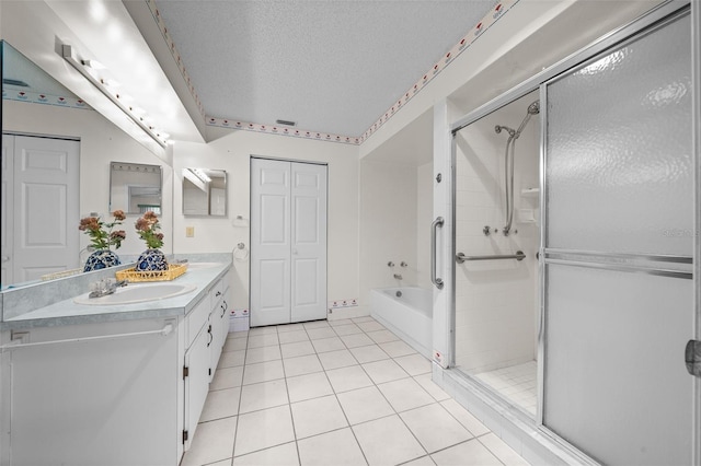 8450 SW 115th Street Rd, Ocala, FL 34481 - full bathroom with a textured ceiling, a sink, tile patterned floors, and a shower stall