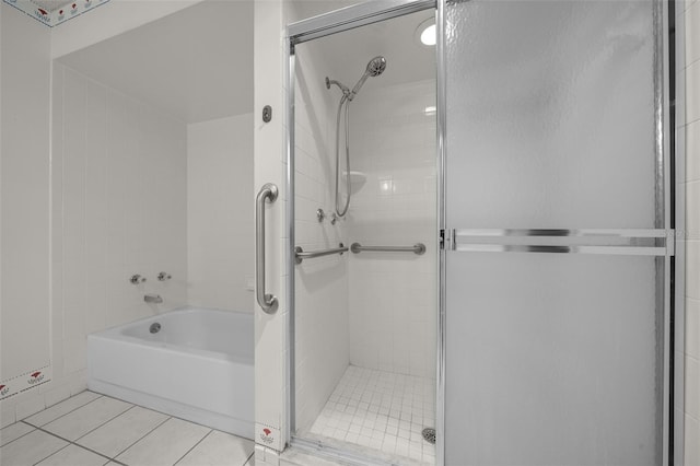 8450 SW 115th Street Rd, Ocala, FL 34481 - full bathroom with tile patterned floors, a bathtub, and tiled shower
