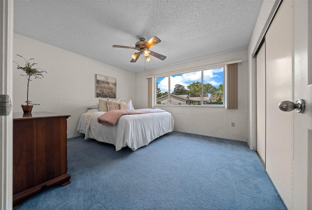8450 SW 115th Street Rd, Ocala, FL 34481 - bedroom with a ceiling fan, carpet floors, a closet, and a textured ceiling