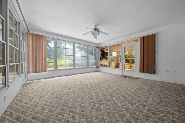 8450 SW 115th Street Rd, Ocala, FL 34481 - unfurnished sunroom featuring ceiling fan