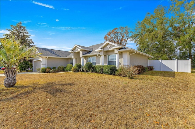 single story home with a front yard