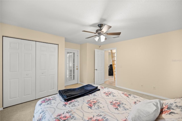 carpeted bedroom featuring ceiling fan and a closet